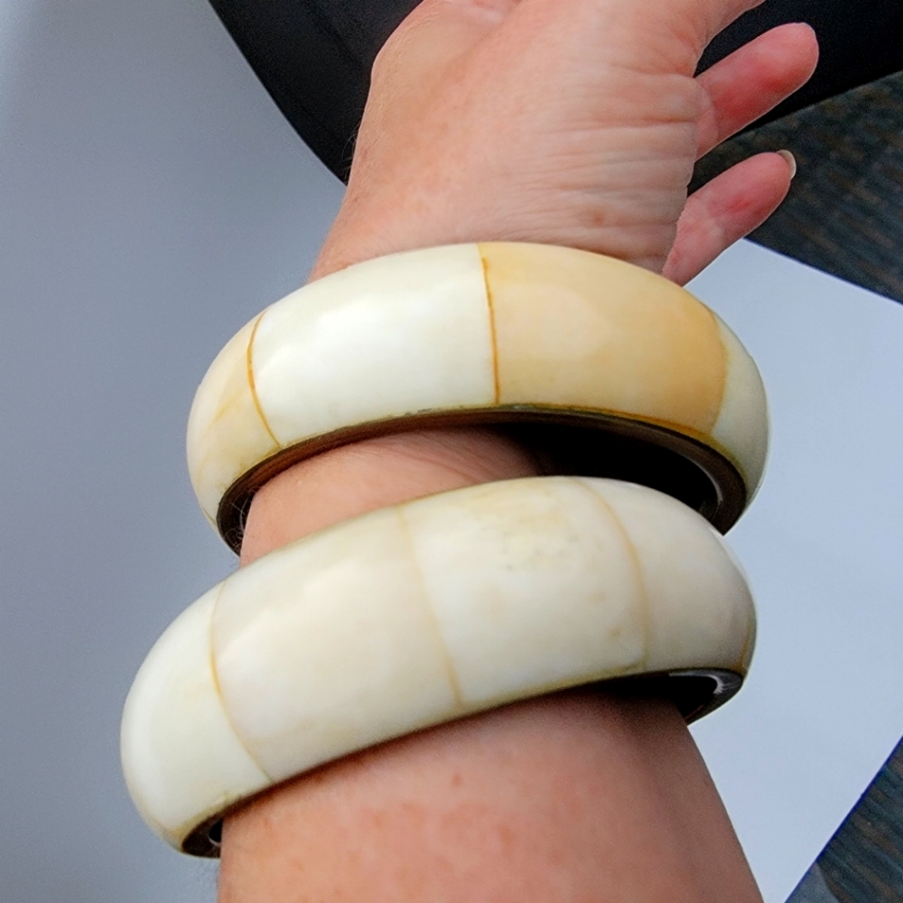 Two bone bangles bracelets